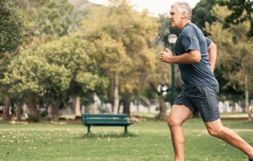 Man running in park, Orthopaedic Surgery
