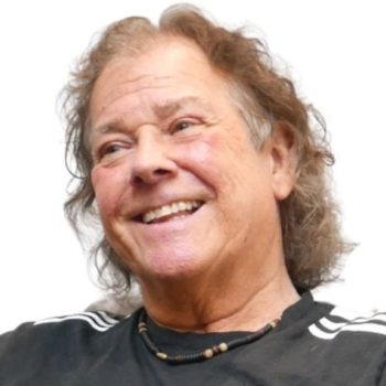 Picture of Steve Way smiling as he shares his story about hip surgery and the support he received at KIMS Hospital.