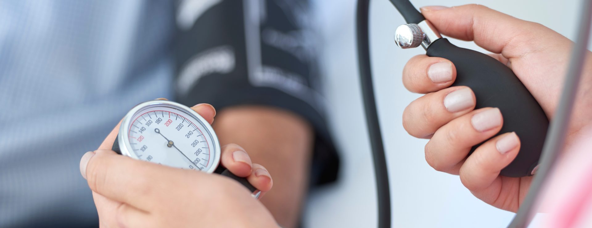 Taking someone's blood pressure