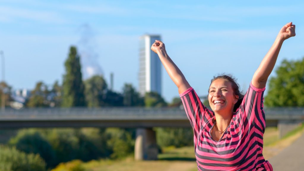 Women celebrating her weight loss treatment