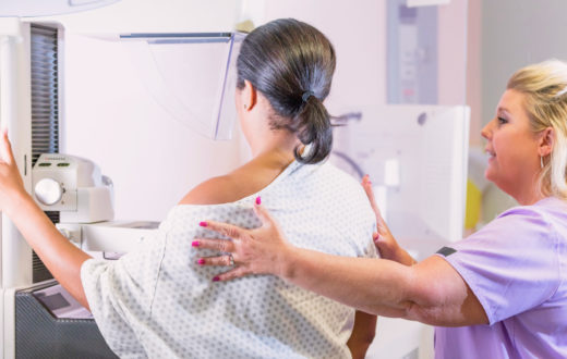 A woman having a mammogram