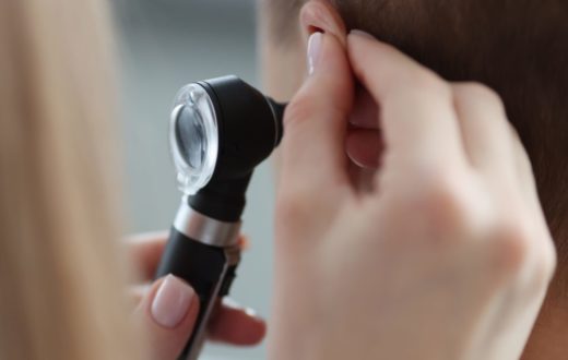 Ear being checked by ENT specialist