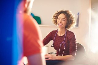 Woman having a health assessment